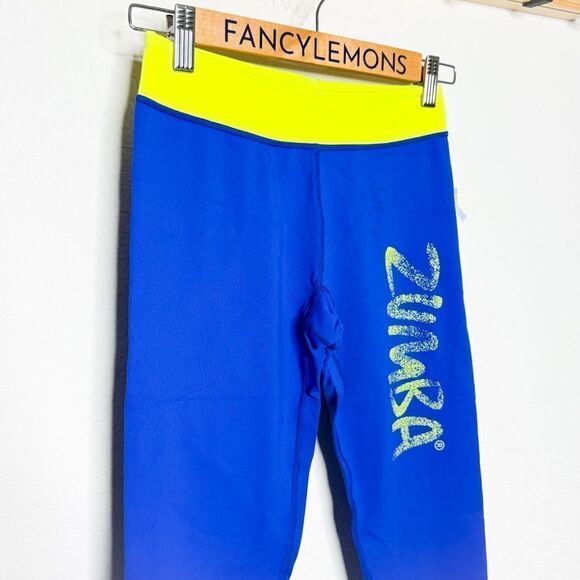 Zumba NWT! Women’s Galaxy Leggings Surf Blue & Neon Yellow Waistband Size Small - Picture 2 of 7